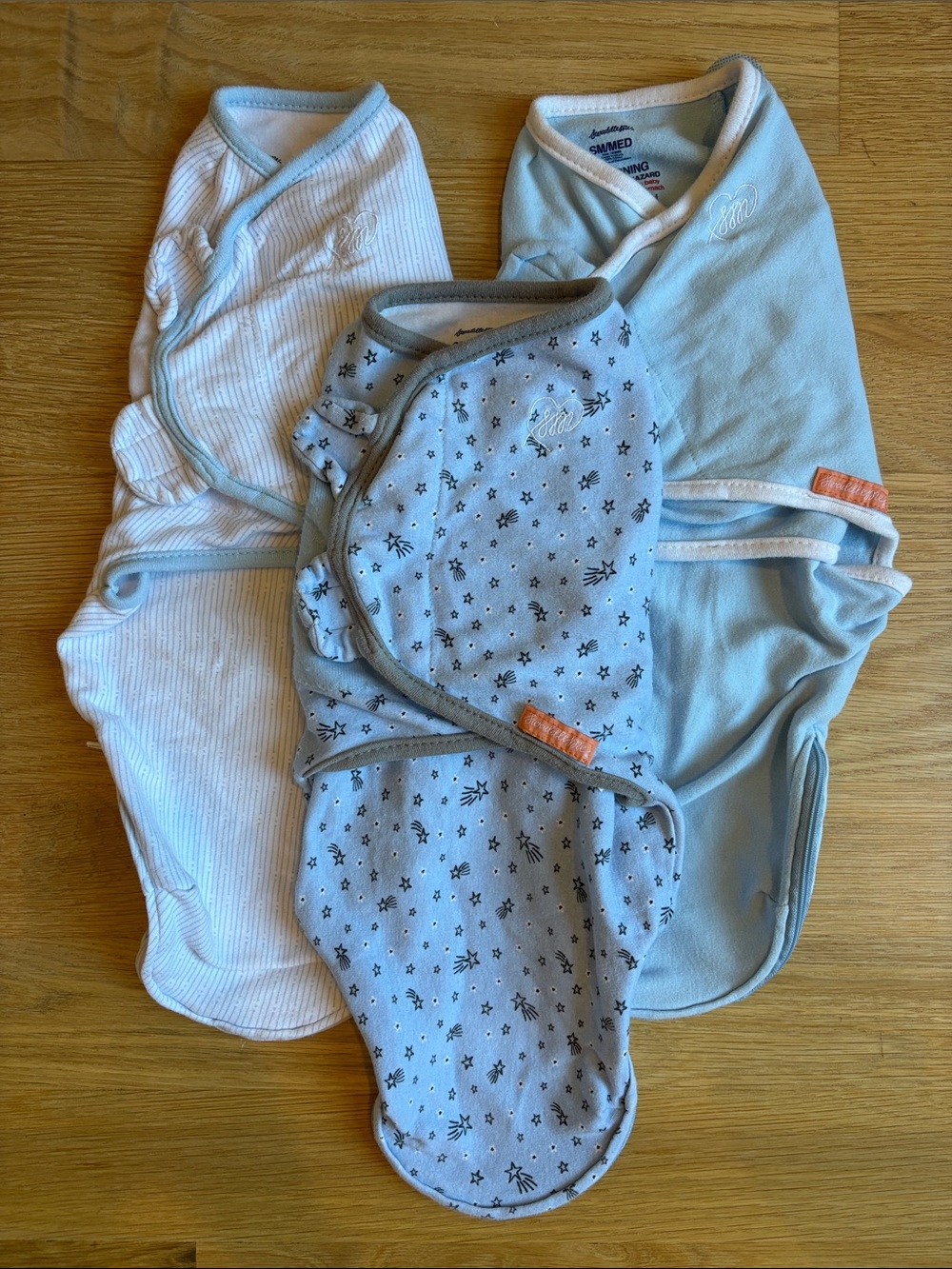 SWADDLEME | Baby One-Piece Swaddles in Light Blue, White, and Blue Star Print